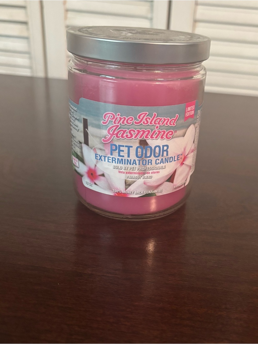 13-ounce Pet Odor Exterminator Candle in the "Pine Island Jasmine" scent